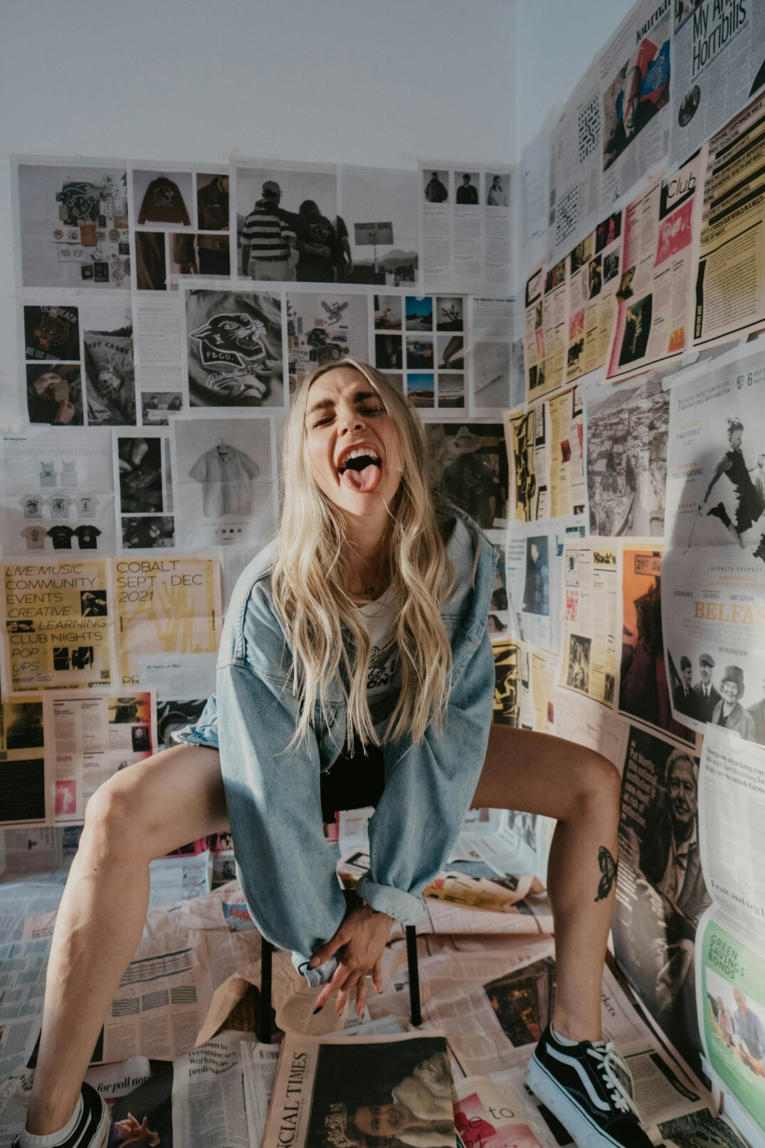 Portrait of a cheerful woman in her late twenties with blonde hair